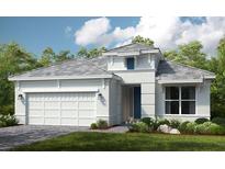 Charming single-story home boasts a neutral palette, well-manicured lawn, and a convenient two-car garage at 4203 Barbuda Ln, Kissimmee, FL 34758