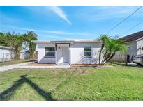 Charming single-story home with well-maintained lawn and curb appeal at 859 Neuse Ave, Orlando, FL 32804