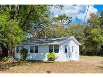 Charming single story home with mature trees, well-maintained lawn, and a fresh exterior paint at 4840 Transport Rd, Bartow, FL 33830
