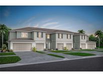 Three-story townhome featuring a two-car garage and complementary colored siding at 3266 Pondside Way, Sanford, FL 32773