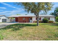 Charming single-story home with red brick accents and mature landscaping at 1109 Denton Rd, Winter Park, FL 32792