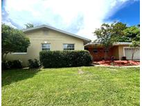 Charming single-story home featuring a well-maintained lawn and mature landscaping at 1511 Leeway Ave, Orlando, FL 32810