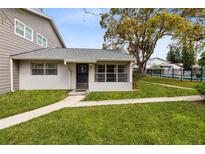 Charming single-story home with well-maintained lawn and front access to community pool at 2788 Curry Ford Rd # A, Orlando, FL 32806
