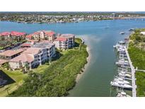 Waterfront condos overlooking a serene harbor, offering deep water access and stunning views at 434 Bouchelle Dr # 202, New Smyrna Beach, FL 32169