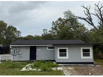 Charming single-story home featuring a neatly painted exterior and minimalist landscaping in a serene setting at 3931 Avenue R Nw, Winter Haven, FL 33881