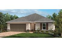 Charming single-story home featuring a two-car garage and well-manicured landscaping at 3381 Sanctuary Dr, Clermont, FL 34714