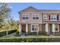 Charming two-story townhome with landscaped yard at 10316 Spring Arbor Ln, Winter Garden, FL 34787