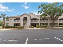 Charming condo building with well-maintained landscaping, reserved parking, and private balconies at 640 Cranes Way # 164, Altamonte Springs, FL 32701