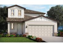 Charming two-story home with a neutral color scheme, a well-manicured lawn, and a two car garage at 2515 Linda Knoll Ln, Bartow, FL 33830