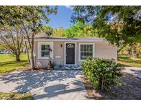 Charming single-story home with a well-manicured lawn and inviting front entrance at 1306 Shepherd Ave, Sanford, FL 32771