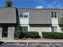 A view of the exterior of the building on a bright day at 1948 Conway Rd # 7, Orlando, FL 32812