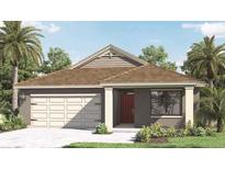Charming single-Gathering home featuring a two-car garage and a well-manicured lawn with tropical landscaping at 491 Taylor Groves Dr, Lake Wales, FL 33898