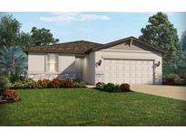 Charming single-story home featuring a two-car garage, nicely landscaped yard, and stone accents at 4550 Windy Oak Way, St Cloud, FL 34772