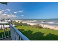 Enjoy serene ocean views from this property with manicured lawns, clear skies, and the sound of waves at 5201 S Atlantic Ave # 405A, New Smyrna Beach, FL 32169