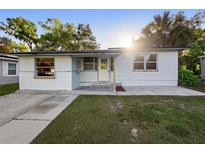 Charming single-story home featuring a well-kept lawn and a classic front entrance at 241 S Marydell Ave, Deland, FL 32720