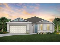 Charming single-story home with a well-manicured lawn and a two-car garage at 6032 Tree Crossing Ln, St Cloud, FL 34771