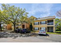 Inviting apartment complex features well-maintained grounds and convenient parking at 2314 Midtown Ter # 1136, Orlando, FL 32839