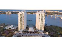Stunning aerial view of waterfront condos and city skyline, showcasing prime real estate at 231 Riverside Dr # 708, Daytona Beach, FL 32117