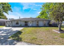 Charming single-story home with a well-maintained lawn and inviting curb appeal at 501 Catwood Dr, Ocoee, FL 34761