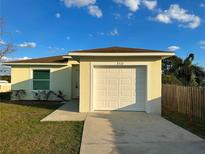 Charming single-story home with a one-car garage and well-maintained front lawn at 3513 Westland Dr, Orlando, FL 32818