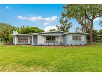 Charming single-story home with a well-manicured lawn and inviting curb appeal at 3107 Troy Dr, Orlando, FL 32806