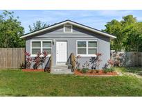 Charming home featuring updated siding, complemented by fresh landscaping and a well-maintained lawn at 3151 S Bumby Ave, Orlando, FL 32806