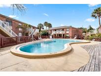 Enjoy the community pool with a well maintained deck and lounging area, perfect for relaxation and socializing at 480 Banyon Tree Cir # 100, Maitland, FL 32751