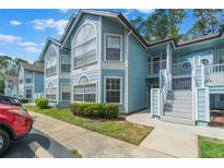 Charming two-story condo with a private entrance and well-maintained landscaping at 2047 Royal Bay Blvd # 21, Kissimmee, FL 34746