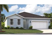 Charming single-story home featuring a well-maintained lawn and a two-car garage at 5925 Cliffbow Loop, Leesburg, FL 34748