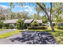 Charming single-story home with mature landscaping and designated parking at 622 Mount Homer Rd # 622, Eustis, FL 32726