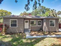 Charming single-story home with a well-maintained front yard and a classic facade at 810 Catalina Dr, Sanford, FL 32771