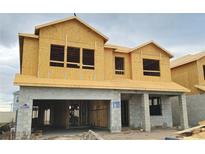 Exterior view of a home under construction with a concrete block first story and plywood second story at 2672 Great Heron Ave, St Cloud, FL 34773