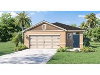 Charming single-story home with a two-car garage, landscaped yard, and a welcoming blue front door at 1321 June Lake Loop, Lake Hamilton, FL 33851