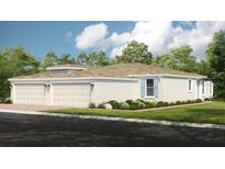 Charming single-story home with a two-car garage, manicured landscaping, and neutral color palette at 5337 Spoonflower Ct, St Cloud, FL 34771