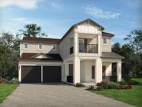 Charming two-story home featuring a two-car garage and inviting front porch and balcony at 5260 Citrus Leaf Blvd, Winter Garden, FL 34787