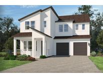 Charming two-story home with a contemporary design, two-car garage and well-manicured lawn at 5278 Citrus Leaf Blvd, Winter Garden, FL 34787