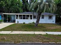 Charming single-story home with a well-manicured lawn and inviting curb appeal at 247 S Marydell Ave, Deland, FL 32720