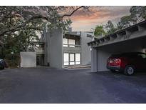A charming condo featuring a covered carport and beautiful architectural details at 102 Fairway Dr # 102, Longwood, FL 32779