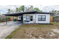 Charming single-story home with a carport and freshly painted exterior at 620 E Church Ave, Longwood, FL 32750
