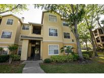 Charming condo featuring multiple windows and landscaped grounds at 2586 Robert Trent Jones Dr # 1116, Orlando, FL 32835