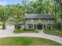 Charming two-story home with a well-manicured front yard, mature trees and beautiful curb appeal at 981 Victoria Ter, Altamonte Springs, FL 32701