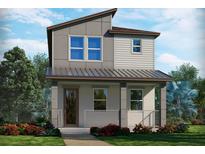Charming two-story home with modern design, front porch, and beautifully landscaped yard at 4549 Cross Prairie Pkwy, St Cloud, FL 34772