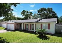 Charming single-story home featuring a well-maintained front lawn, brick accents, and a cozy, welcoming facade at 808 Woodling Pl, Altamonte Springs, FL 32701