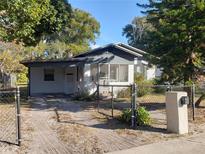 Charming single-story home featuring a fenced yard and driveway at 539 Clark St, Maitland, FL 32751