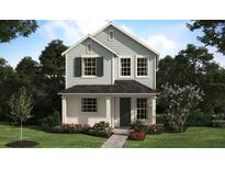 Charming two-story home featuring a covered entry, black shutters, and beautifully landscaped front yard at 451 Scotsmans Pl, Debary, FL 32713