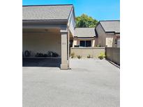 This home features a convenient carport for easy parking and protection from the elements at 240 Windmeadows St # 240, Altamonte Springs, FL 32701