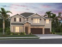 Beautiful two-story home featuring a three car garage and stone accents at 3028 Water Clover Ct, Apopka, FL 32712