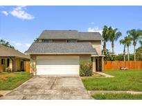 Charming two-story home featuring a two-car garage and well-maintained lawn at 368 Amethyst Ct, Lake Mary, FL 32746