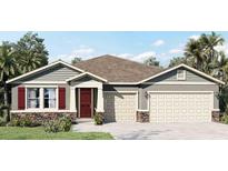 Charming single-story home with stone accents, neutral colors, and a well-manicured lawn in a sunny location at 796 Mocking Jay Ln, St Cloud, FL 34771
