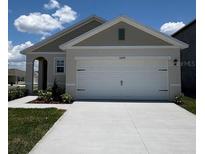 Charming one-story home featuring a two-car garage and well-maintained landscaping at 3449 Briarwood Grove Dr, Ocoee, FL 34761